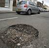 Pothole for every mile of road in the UK image