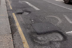 Councils warned over £16m fake pothole claims image