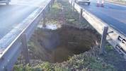 Highways Agency contractors stabilise 15-foot deep sinkhole on M2 image