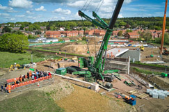 Residents crane to see bridge beam job image