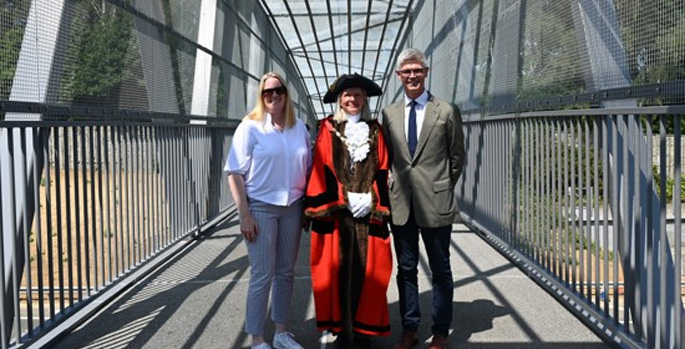 Delayed M3 footbridge opens after concrete setback